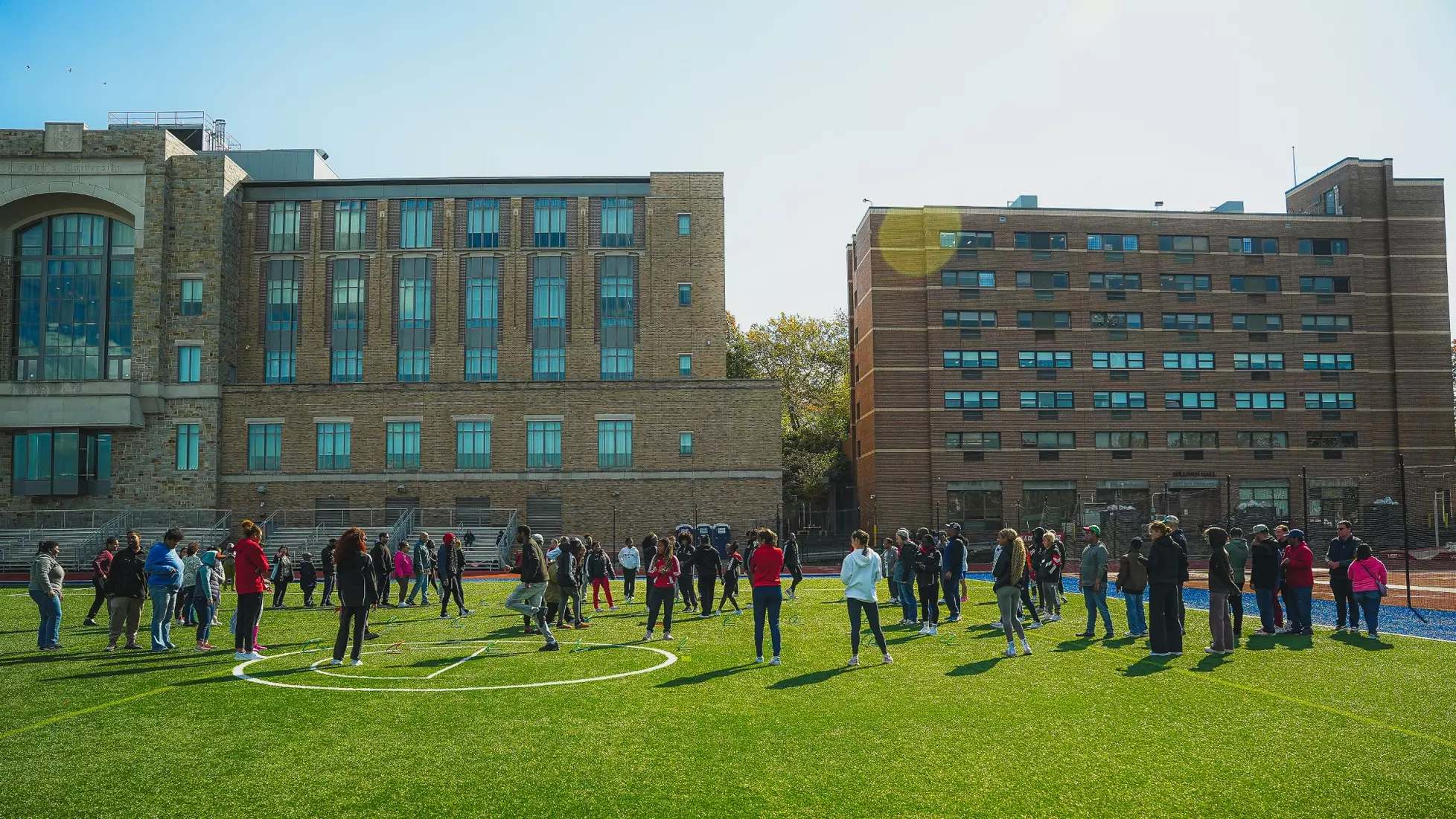 Members of the St. John's track and field team accumulated over 300 hours of community service while hosting Queens Centers for Progress (QCP).
