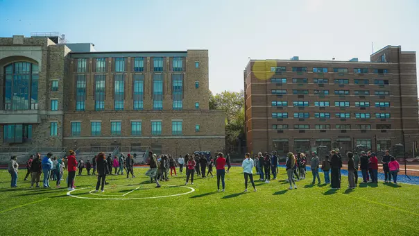 Members of the St. John's track and field team accumulated over 300 hours of community service while hosting Queens Centers for Progress (QCP).
