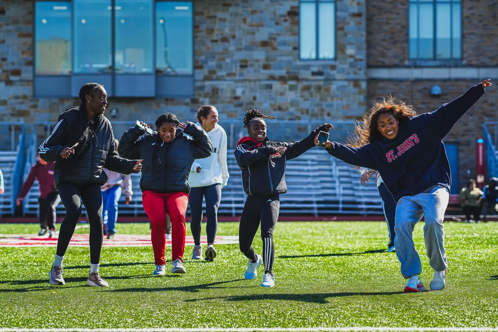 St. John's track and field with members of QCP.