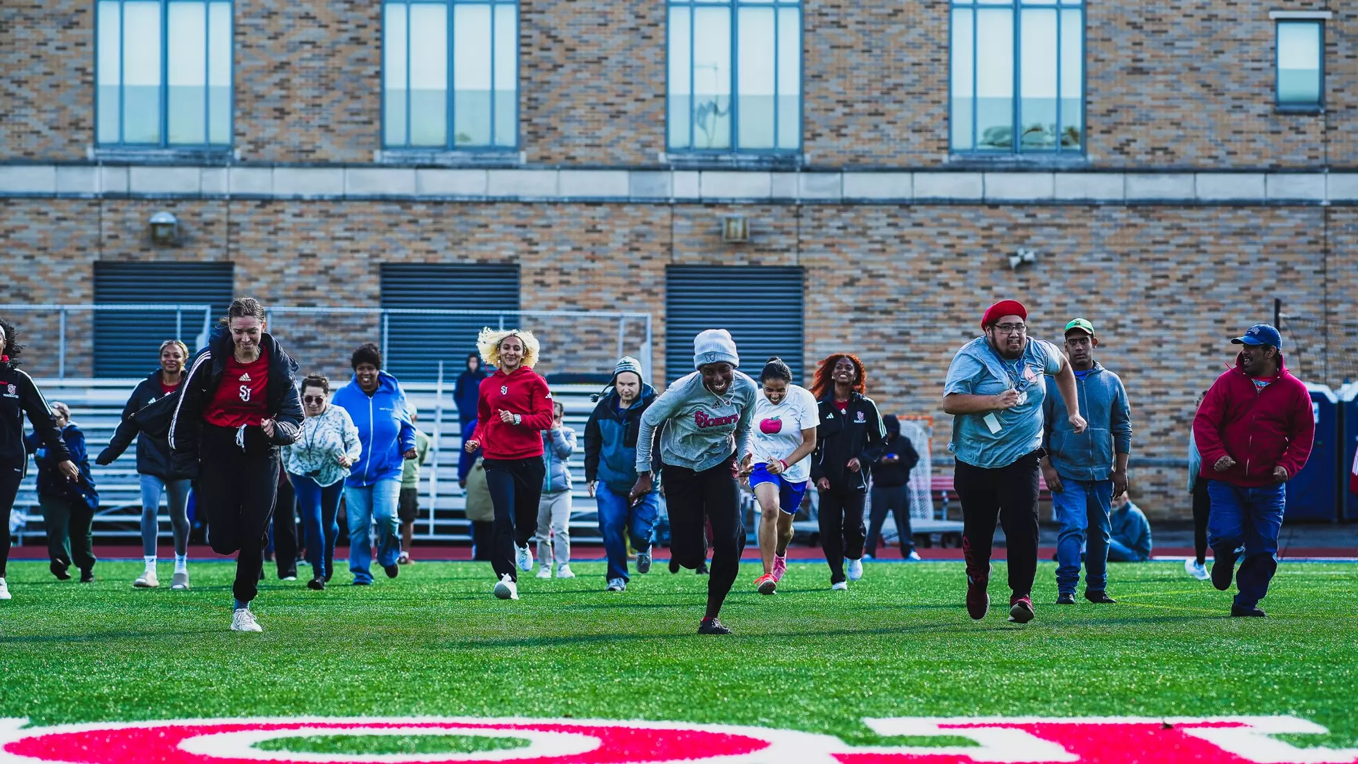 St. John's track and field with members of QCP.
