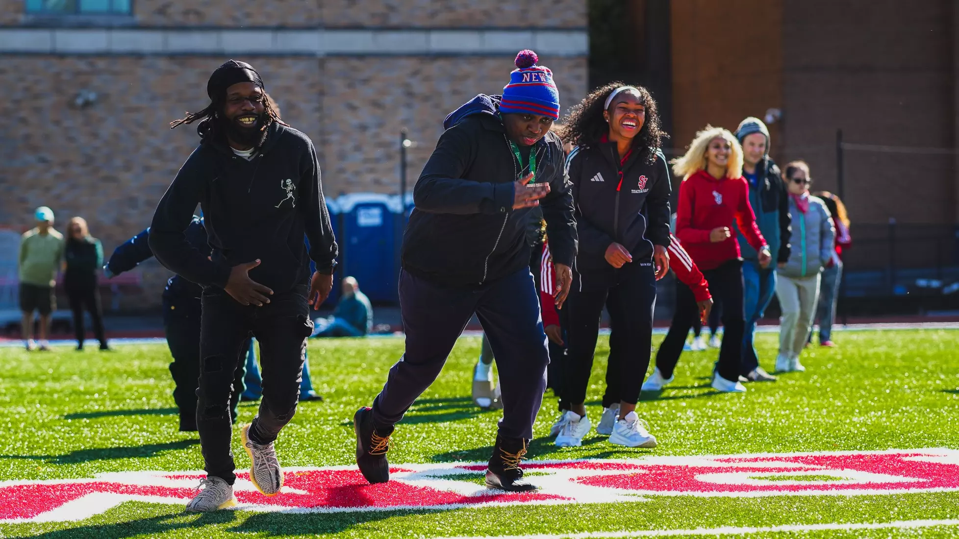 St. John's track and field with members of QCP.