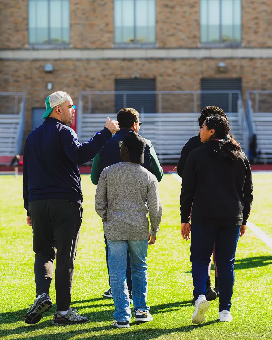 St. John's track and field with members of QCP.