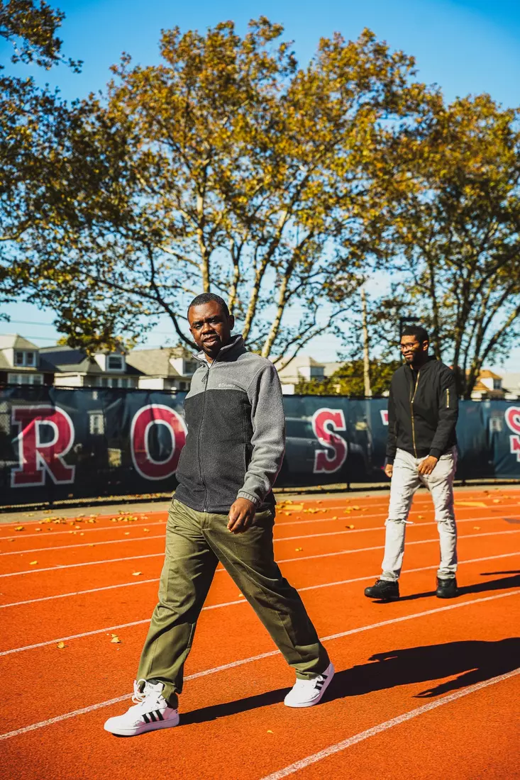 Members of QCP walking the track at the DaSilva Athletic Complex.