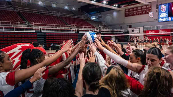 St. John's Volleyball huddle