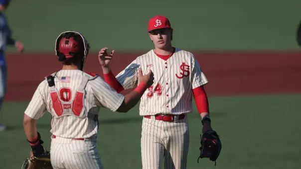 Victor Fredrick and Adam Agresti High Five Celebrate Win