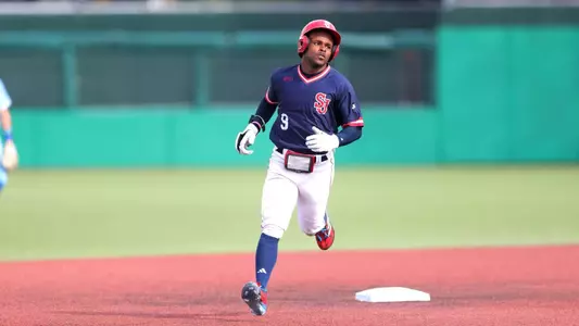 Jon LeGrande rounds second after blasting a 3 run homer