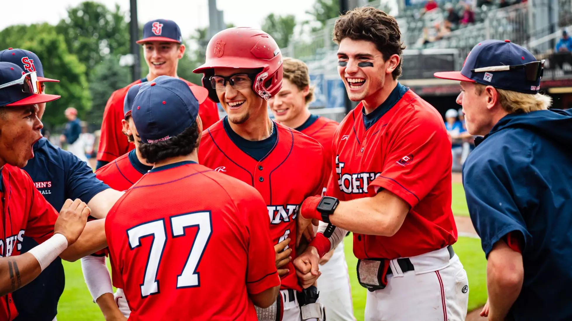 Cristian Bernardini and team celebrating his leadoff solo home run in the bottom of the third inning