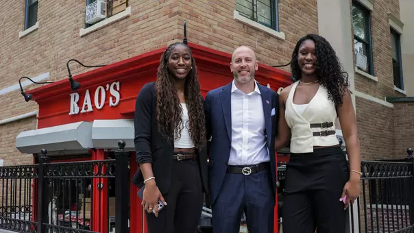 Head Coach Joe Tartamella, Brooke Moore and Sa'Mya Wyatt Outside of Rao's in Harlem for the 2026 "An Afternoon with St. John's Women's Basketball"