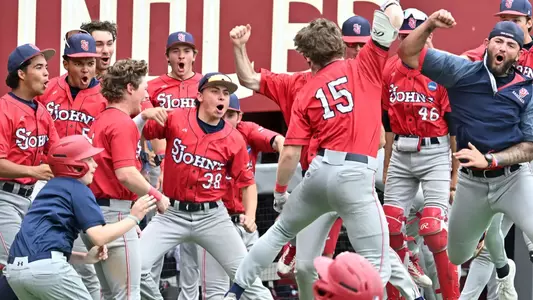 Team celebrates Dylan Fitzsimmons three run homer