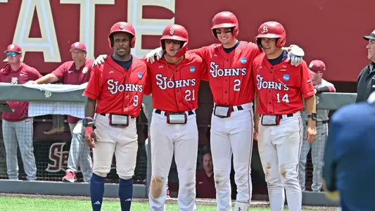Jon LeGrande, Rob Mansour, Will Cowan and Jayder Raifstanger wait for Adam Agresti to cross home on his grand slam