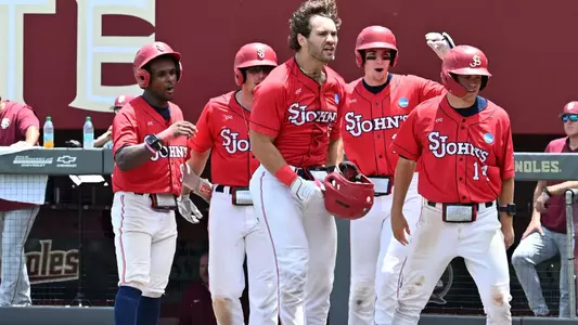 Jon LeGrande, Rob Mansour, Will Cowan, Jayder Raifstanger and Adam Agresti celebrate Agresti's grand slam