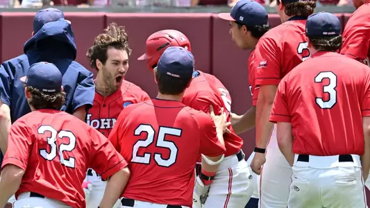 Adam Agresti and Team celebrate Agresti's grand slam