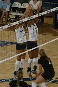 Freshman Jessica Holderness (19) and Karyn Morgan (3) had career highs in blocks against UTSA.