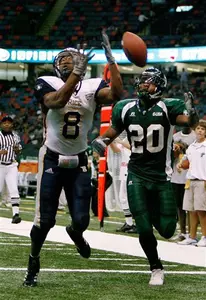 Rice defensive back Lance Byrd breaks up a pass intended for Tulane wide receiver Jeremy Williams.