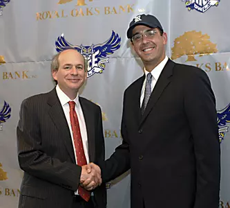 Rice President David W. Leebron (left) welcomes Chris Del Conte as Rice's new director of athletics.