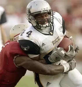 Quinton Smith runs for fourth-quarter yardage.