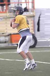 Chase Clement looks for a receiver during Wednesday's workout at the Houston Texans facility