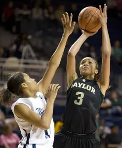 Brianna Hypolite attempts to block a shot Sunday against Baylor.