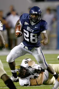 Rice's Charles Ross (28) runs 48-yards for a touchdown.