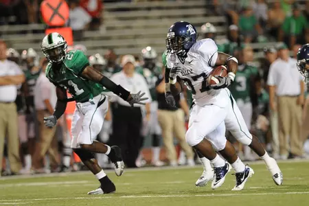 Tyler Smith breaks free for a 48-yard run in the second half of the Owls' 32-31 win over North Texas.