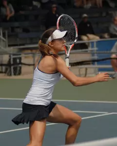 Dominique Harmath's 93rd career win led the Owls into Saturday's semifinals.