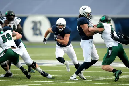 Luke Turner ran for a season-high 54 yards and threw a touchdown pass to spark the Owls.