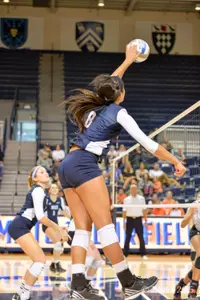 Chelsey Harris had 13 kills in the Owls' 3-0 win at Marshall.