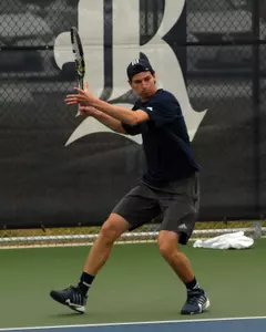 David Warren improved to 15-6 in spring singles with a straight set win at No. 5 singles.
