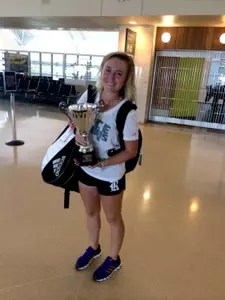 Lindsey Hodge gladly had an additional carry-on for the flight home to Houston.