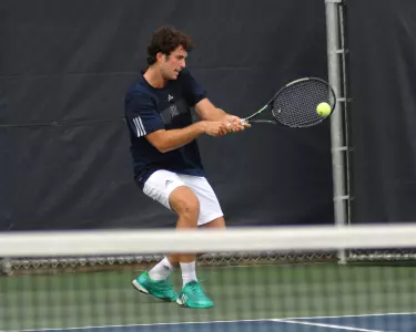 Eric Rutledge won his team-leading 17th dual singles match on Sunday.