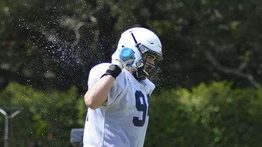 Graysen Schantz cools off during Sunday's practice.