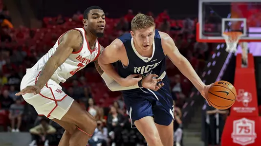 November 12, 2021 :   During a regular season game between the Rice Owls and the University of Houston Cougars at the Fertitta Center in Houston, Texas.   (Mandatory Credit:  Maria Lysaker | Rice Athletics)