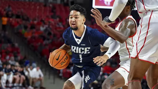 November 12, 2021 :   During a regular season game between the Rice Owls and the University of Houston Cougars at the Fertitta Center in Houston, Texas.   (Mandatory Credit:  Maria Lysaker | Rice Athletics)