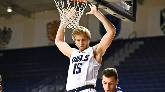 October 31, 2022: Rice Owls forward Max Fiedler (15) dunks the ball during the first half against the Rockhurst Hawks at Tudor Fieldhouse in Houston, Texas. Mandatory Credit: Maria Lysaker | Rice Athletics
