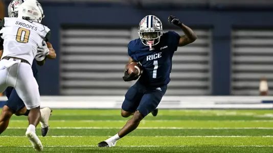 October 01, 2022: Rice Owls running back Cameron Montgomery (1) receives the pass and runs the ball during the second quarter against the UAB Blazers at Rice Stadium in Houston, Texas. Mandatory Credit: Maria Lysaker | Rice Athletics