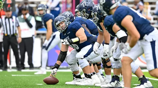 October 29, 2022: Rice Owls center Shea Baker (58) and the offensive linemen in action during the third quarter against Charlotte 49ers at Rice Stadium in Houston, Texas. Mandatory Credit: Maria Lysaker | Rice Athletics