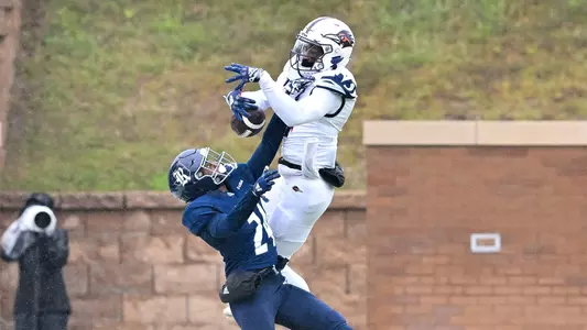 November 19, 2022: Rice Owls cornerback Miles McCord (24) breaks up the play to UTSA Roadrunners wide receiver Isaiah Davis (14) during the second half at Rice Stadium in Houston, Texas. Mandatory Credit: Maria Lysaker | Rice Athletics