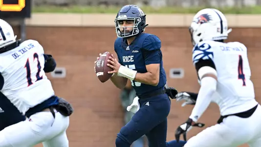 November 19, 2022: Rice Owls quarterback Shawqi Itraish (15) looks to pass the ball during the first half against the UTSA Roadrunners at Rice Stadium in Houston, Texas. Mandatory Credit: Maria Lysaker | Rice Athletics