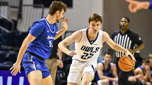 October 31, 2022:  Rice Owls guard Jackson Peakes (22) drives to the basket during the second half against the Rockhurst Hawks at Tudor Fieldhouse in Houston, Texas. Mandatory Credit: Maria Lysaker | Rice Athletics
