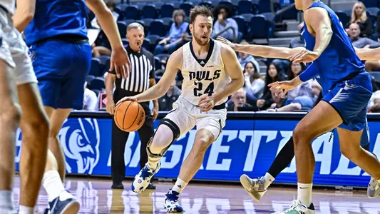 October 31, 2022: Rice Owls guard Jake Lieppert (24) controls the ball against the Rockhurst Hawks during the first half at Tudor Fieldhouse in Houston, Texas. Mandatory Credit: Maria Lysaker | Rice Athletics
