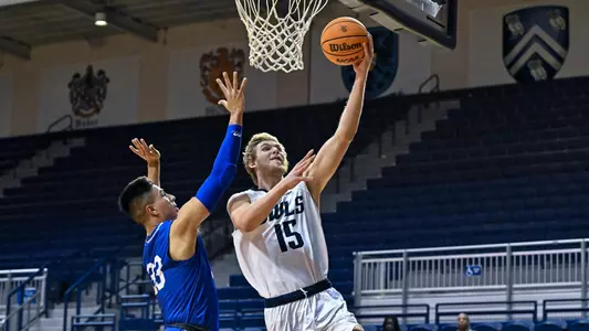 October 31, 2022: Rice Owls forward Max Fiedler (15) makes a lay-up during the first half against the Rockhurst Hawks at Tudor Fieldhouse in Houston, Texas. Mandatory Credit: Maria Lysaker | Rice Athletics