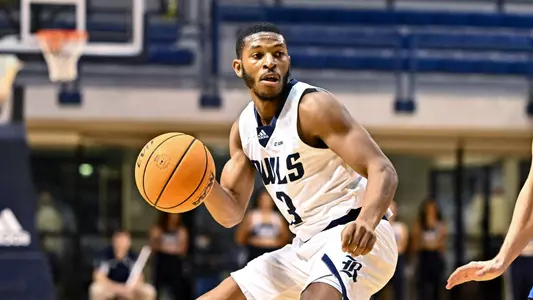 October 31, 2022:  Rice Owls guard Travis Evee (3) drives to the basket during the first half against the Rockhurst Hawks at Tudor Fieldhouse in Houston, Texas. Mandatory Credit: Maria Lysaker | Rice Athletics