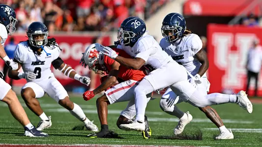 September 10, 2022: Rice Owls defensive back Gabe Taylor (26), cornerback Sean Fresch (1), linebacker Chris Conti (11) and linebacker Treshawn Chamberlain (8) in action during the first quarter of the Bayou Bucket Classic against the Houston Cougars at TDECU Stadium in Houston, Texas. (Mandatory Credit: Maria Lysaker | Rice Athletics)