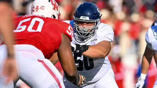 September 10, 2022: Rice Owls defensive lineman Izeya Floyd (50) in action during the first quarter of the Bayou Bucket Classic against the Houston Cougars at TDECU Stadium in Houston, Texas. (Mandatory Credit: Maria Lysaker | Rice Athletics)