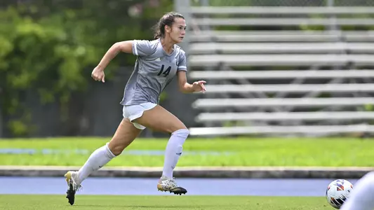 August 21, 2022, Houston, Texas, USA; Rice Owls midfielder Mikala Furuto (14) in action during the match against the Samford Bulldogs at Holloway Field Rice University.  (Mandatory Credit:  Maria Lysaker | Rice Athletics)