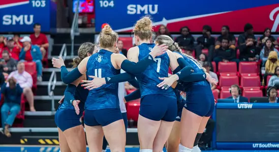 Rice volleyball huddles up during a recent match