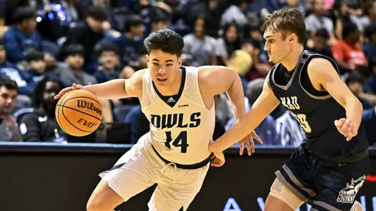 December 15, 2022: Rice Owls guard Reed Myers (14) controls the ball against the North American Stallions during the second half at Tudor Fieldhouse in Houston, Texas. Mandatory Credit: Maria Lysaker | Rice Athletics