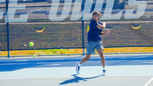 Rice men's tennis player Kabeer Kapasi returns a serve during a recent match.