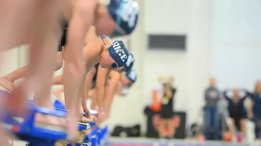 A Rice swimmer readies for the start of an event at the 2024 AAC Championships