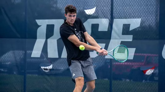 Rice men's tennis player Petro Kuzmenok makes a return shot during a recent match